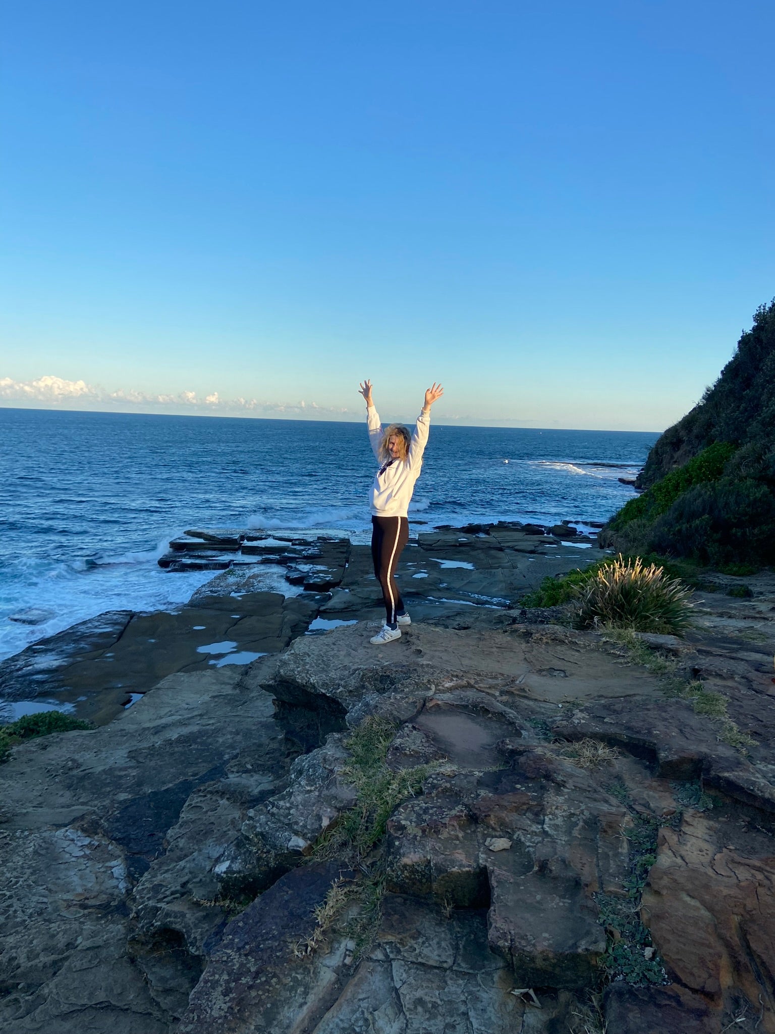 Hands_in_the_air_letting_go_meditationforwellness.jpg